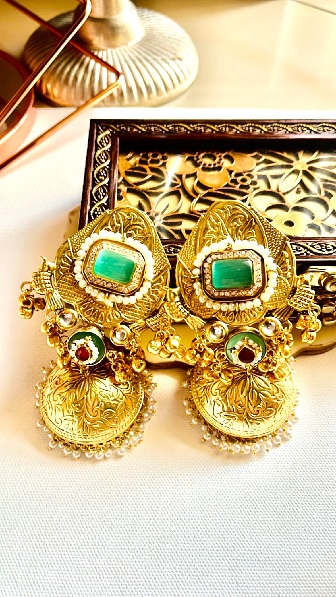 Raunika Golden Jhumka Earring